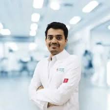 Dr Adarsh K